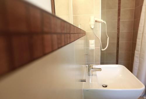 Kylpyhuone majoituspaikassa Fürjes Villa Apartmanház