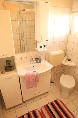 Koupelna v ubytování APARTMANI SARLIJA