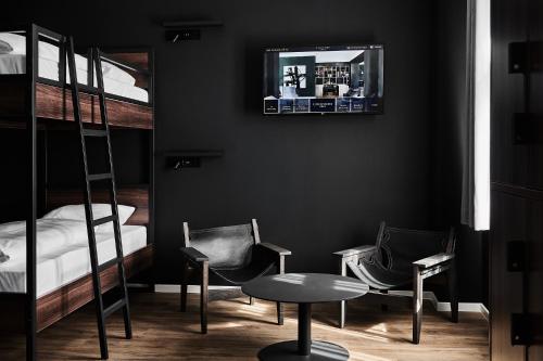 Una cama o camas en una habitación de GRONERS Leipzig City Center