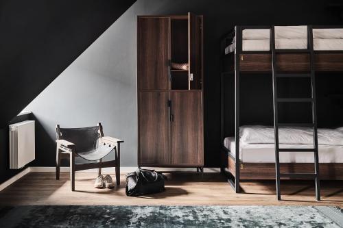 Una cama o camas en una habitación de GRONERS Leipzig City Center