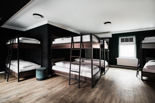Una cama o camas en una habitación de GRONERS Leipzig City Center