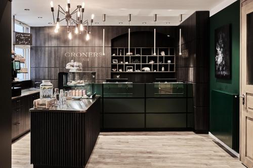Una cocina o cocineta en GRONERS Leipzig City Center