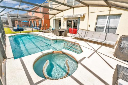 Disney Dream with Hot Tub, Pool, Xbox, Games Room, Lakeview, 10 min to Disney, Clubhouse photo 16