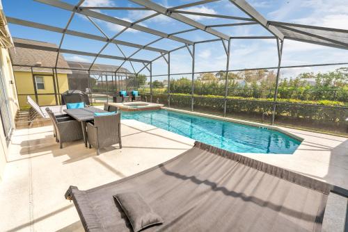 Disney Dream with Hot Tub, Pool, Xbox, Games Room, Lakeview, 10 min to Disney, Clubhouse photo 15