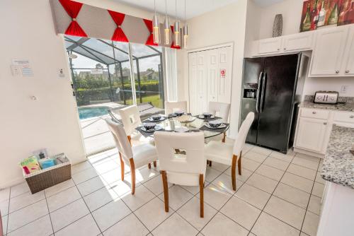 Disney Dream with Hot Tub, Pool, Xbox, Games Room, Lakeview, 10 min to Disney, Clubhouse photo 24