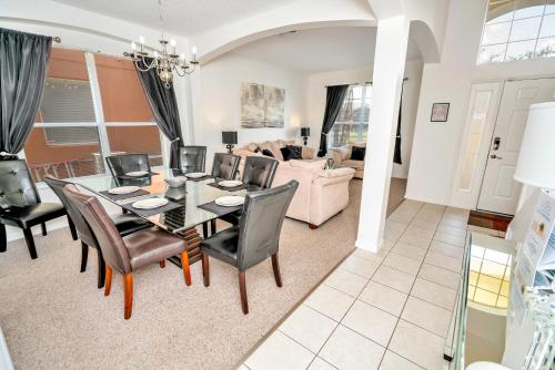Disney Dream with Hot Tub, Pool, Xbox, Games Room, Lakeview, 10 min to Disney, Clubhouse photo 27