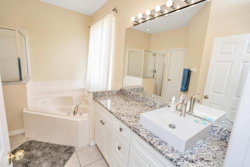 Disney Dream with Hot Tub, Pool, Xbox, Games Room, Lakeview, 10 min to Disney, Clubhouse photo 35