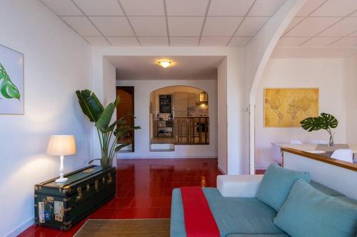 a living room with a couch and a table at The Palm in Pognana Lario