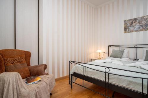 Postel nebo postele na pokoji v ubytování Dream Stay - Main Square Apartment with Picturesque View