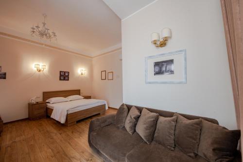 Ένα ή περισσότερα κρεβάτια σε δωμάτιο στο Hotel Loredano