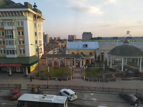 a view of a city with a large building at Апартаменти Світлий Ранок та Затишний Вечір in Rivne