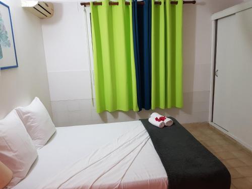Cama o camas de una habitación en ROY'AL BEACH HOLIDAYS