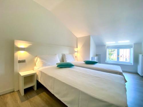 A bed or beds in a room at ABIES lago di Como