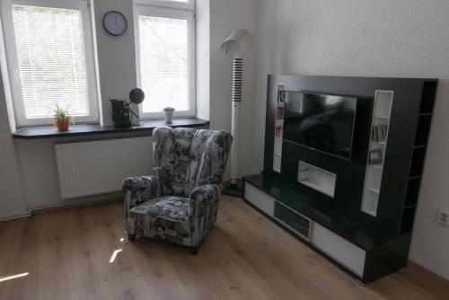 Uma TV ou centro de entretenimento em Apartment Belvedere