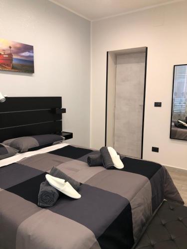 Postel nebo postele na pokoji v ubytování Dal Barce Rooms