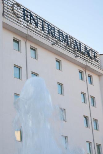 a building with a snow sculpture in front of it at Centrum Palace Hotel & Resorts in Campobasso