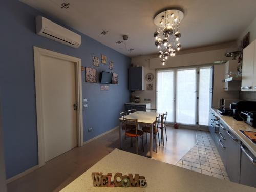 Kuchyň nebo kuchyňský kout v ubytování Ai Giardini Rooms -vicino Ospedale Borgo Trento e centro storico