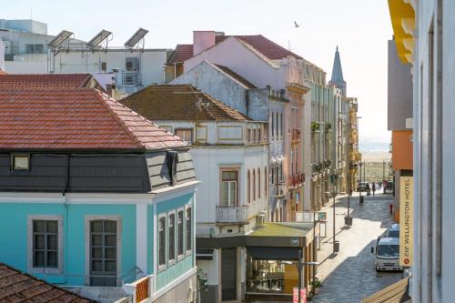 a view of a city street with buildings at Flat Casino Beach Figueira da Foz - Moderno & Ótima Localização! in Figueira da Foz