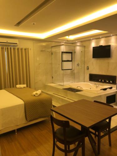 Ένα ή περισσότερα κρεβάτια σε δωμάτιο στο HOTEL ROYAL AMAMBAI