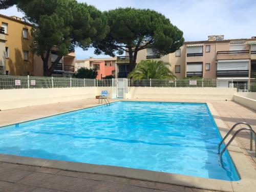 Studio a Le Grau d'Agde avec piscine partagee et jardin clos