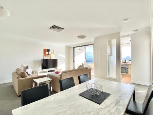 Area soggiorno di Milson Serviced Apartments