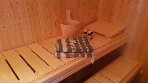 a inside of a sauna with a towel and a juicer at Die kleine Karthause in Konz