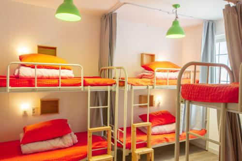 Postel nebo postele na pokoji v ubytování SUM Guesthouse Jeju Airport
