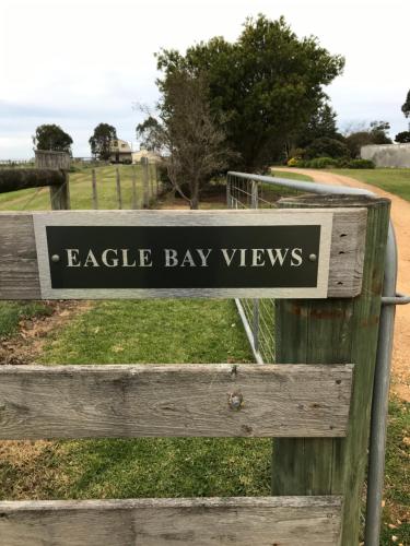 a sign for the gate to the beach at eagle bay views at Eagle Bay Views in Eagle Point