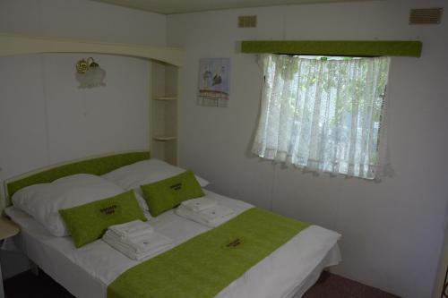 Postel nebo postele na pokoji v ubytování BUNGALOW PARK