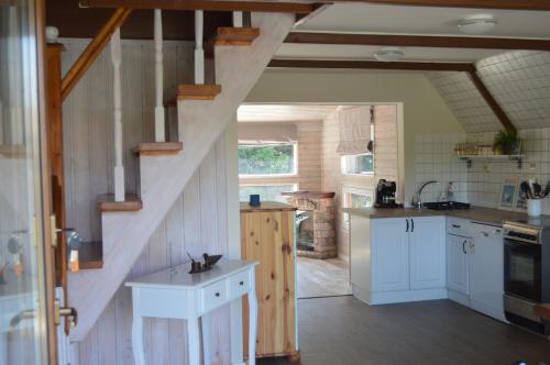 
A kitchen or kitchenette at Intertranscoop Lake House
