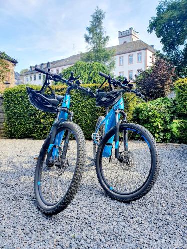 two bikes are parked next to each other at Boutique Hotel Marielle in Bad Münstereifel