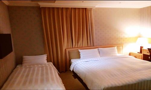 Cama ou camas em um quarto em A casa Hotel