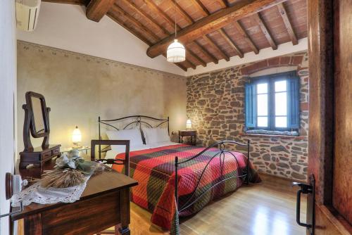 A bed or beds in a room at Casa Vacanze La Porta