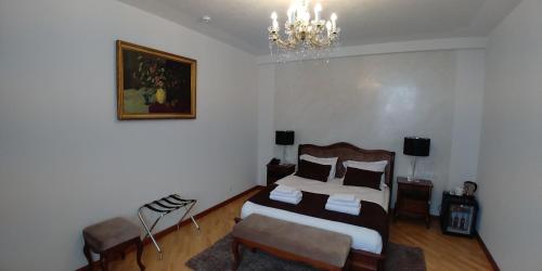 Ένα ή περισσότερα κρεβάτια σε δωμάτιο στο Hotel Meridian