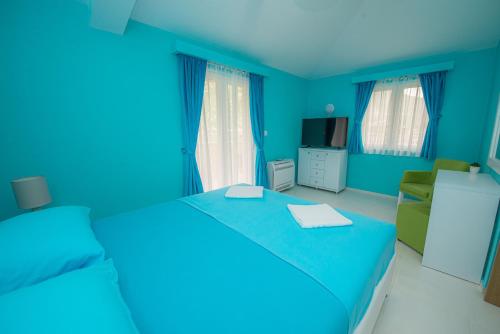 Una cama o camas en una habitación de Apartments Biskupović