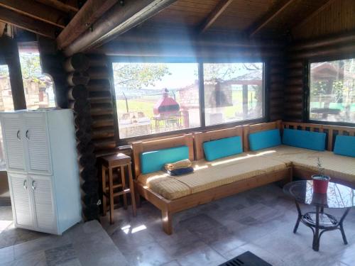 Posezení v ubytování Unique Stone and Wood Eco house