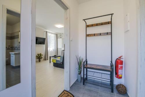Televízia a/alebo spoločenská miestnosť v ubytovaní Apartmány Malen