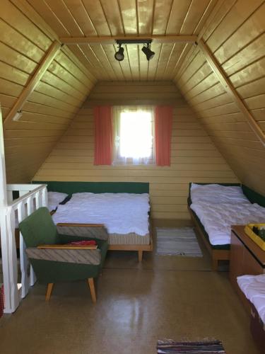 Postel nebo postele na pokoji v ubytování Chata Strmá