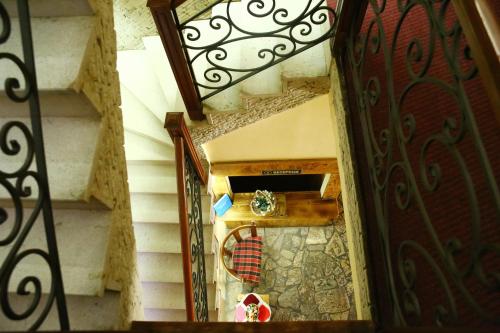 an overhead view of a stairway with a door at Turistički centar Vučje in Nikšić