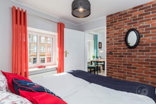 Posteľ alebo postele v izbe v ubytovaní Goma Rent Długa Old Town Gdańsk