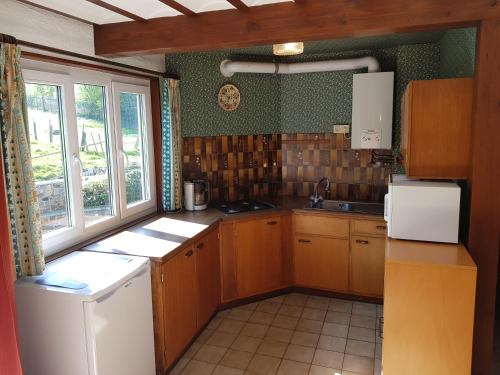Una cocina o zona de cocina en Source d'Arimont