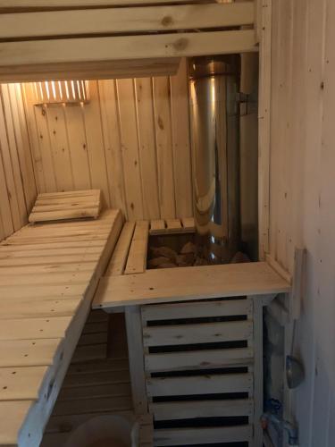 a inside of a sauna with a bunk bed at Zakątek RąbÓwka Dom Ryby Bania in Rąb