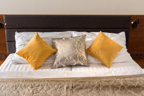 Postel nebo postele na pokoji v ubytování Residence Hluboká