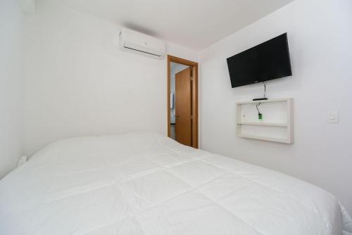 Katil atau katil-katil dalam bilik di Excelente 2 Quartos em Setúbal Boa Viagem ideal para famílias e executivos PM306