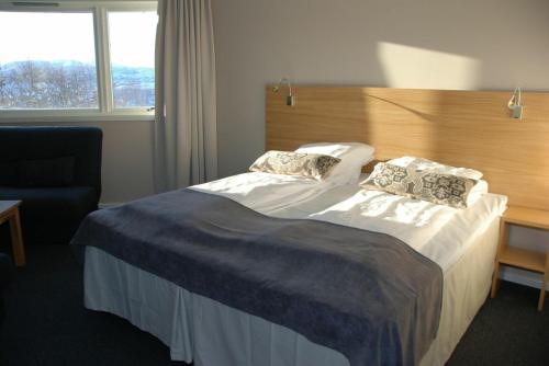 
Een bed of bedden in een kamer bij Sirdal Høyfjellshotell
