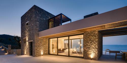 a house with a view of the ocean at Nuez Villas in Mochlos