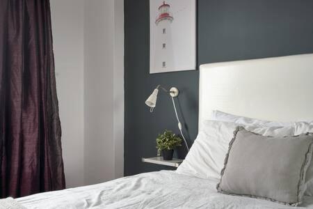 Кровать или кровати в номере Lincoln Suite