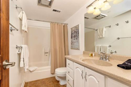 a bathroom with a sink and a toilet and a shower at Aspenwood 2 bedroom K-17 in Snowmass Village