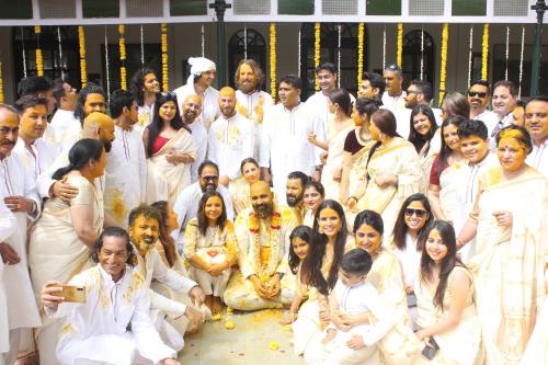 a group of people in white posing for a picture at Savoy - IHCL SeleQtions in Ooty