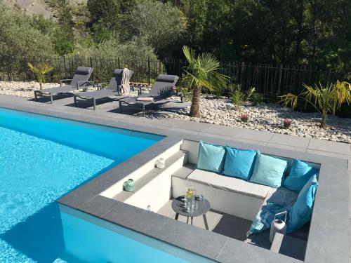 Piscina en o cerca de Le Mas des Doux Instants